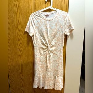 Parker. Pretty romper for your warm winter getaways or keep for our summer days